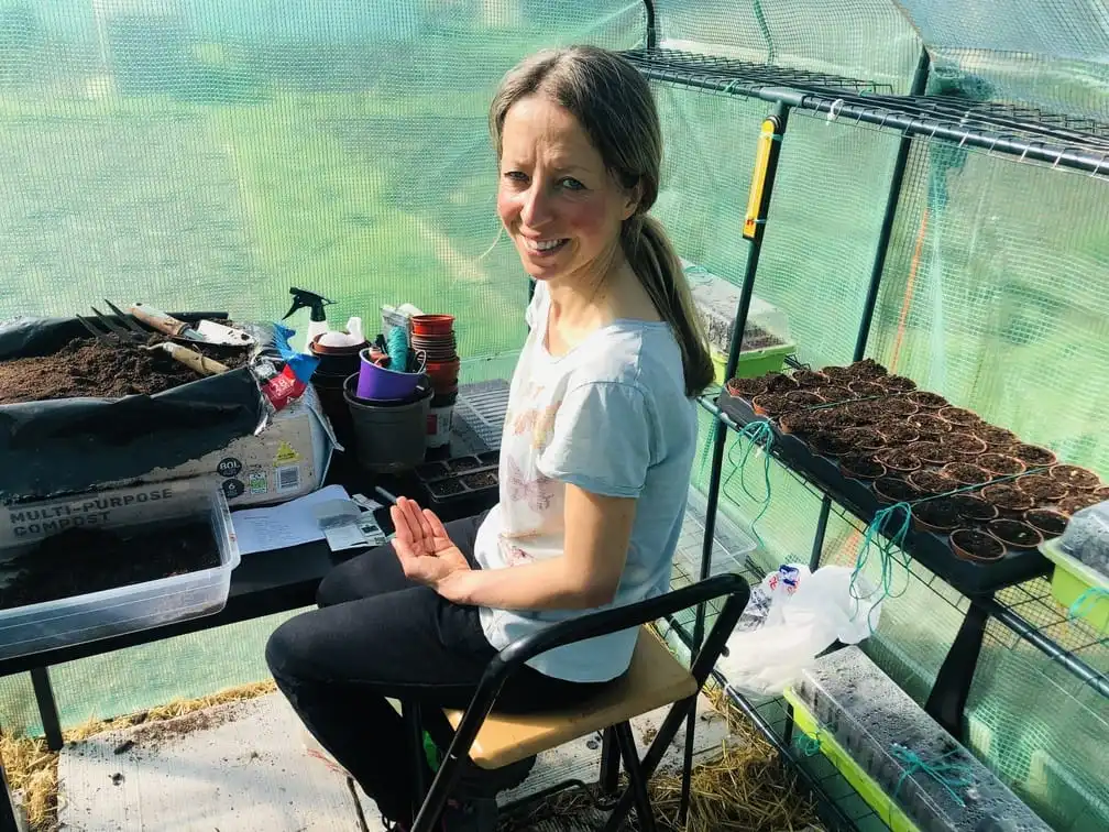 Vicky Salter sowing seeds at the allotment