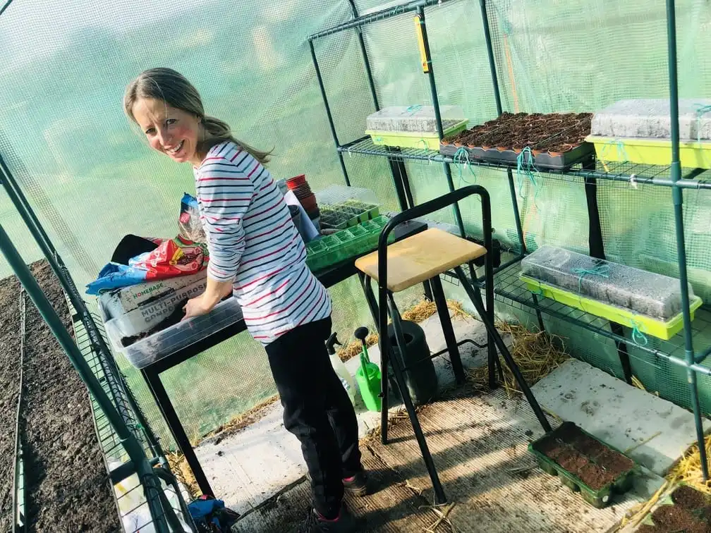 Vicky Salter sowing seeds at the allotment