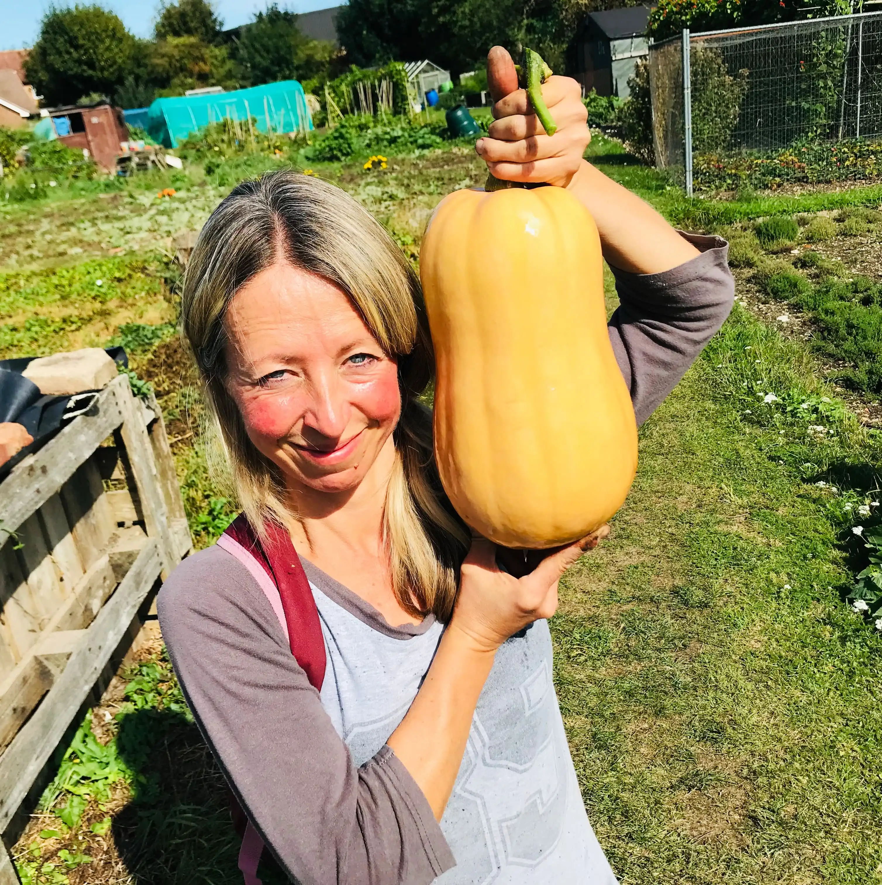 Vicky showing off one of our Butternut Squashes Vicky Salter holding a butternut squash
