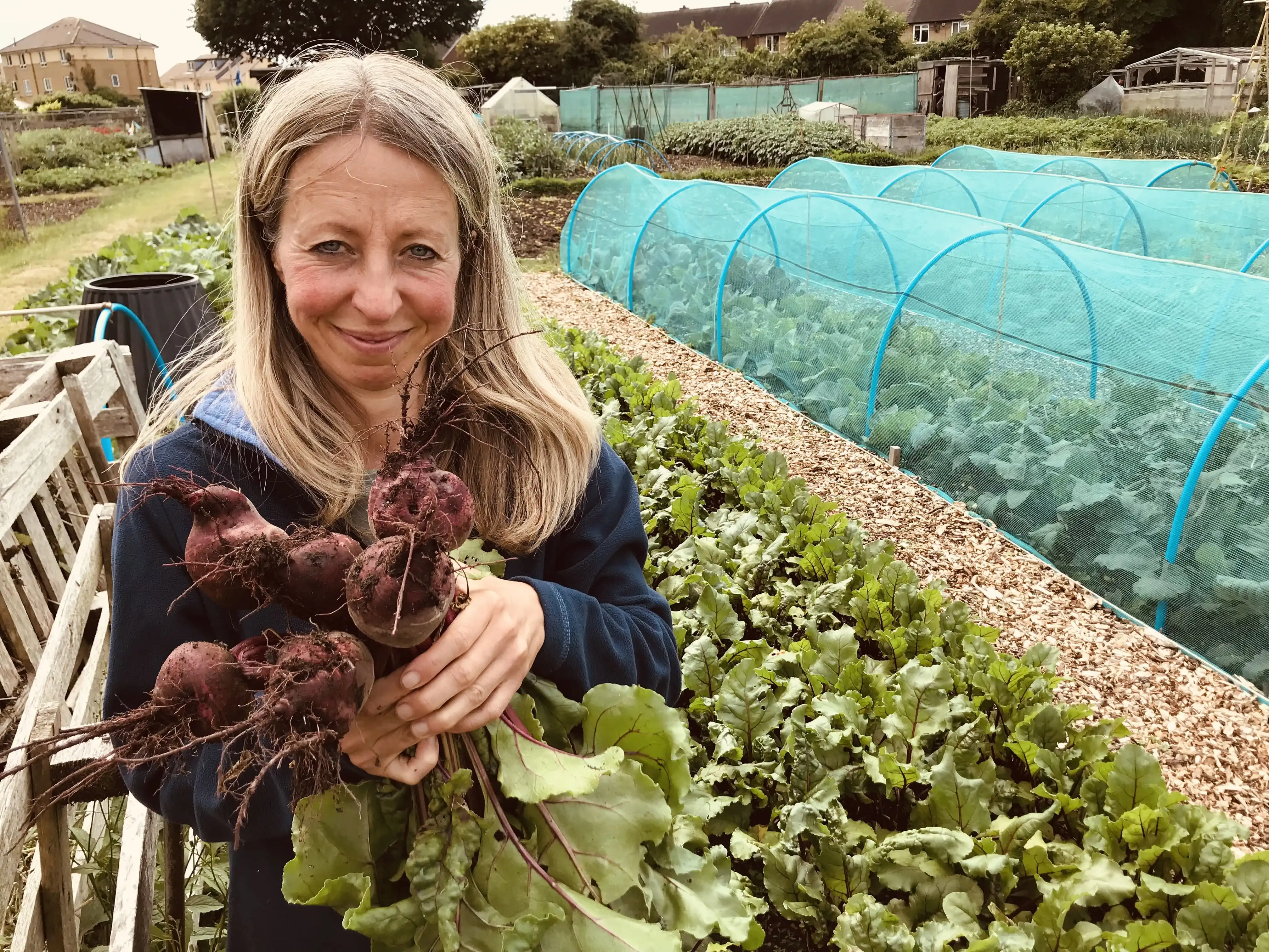 Vicky Salter holding beetroot in early June 2025 Vicky Salter holding beetroot