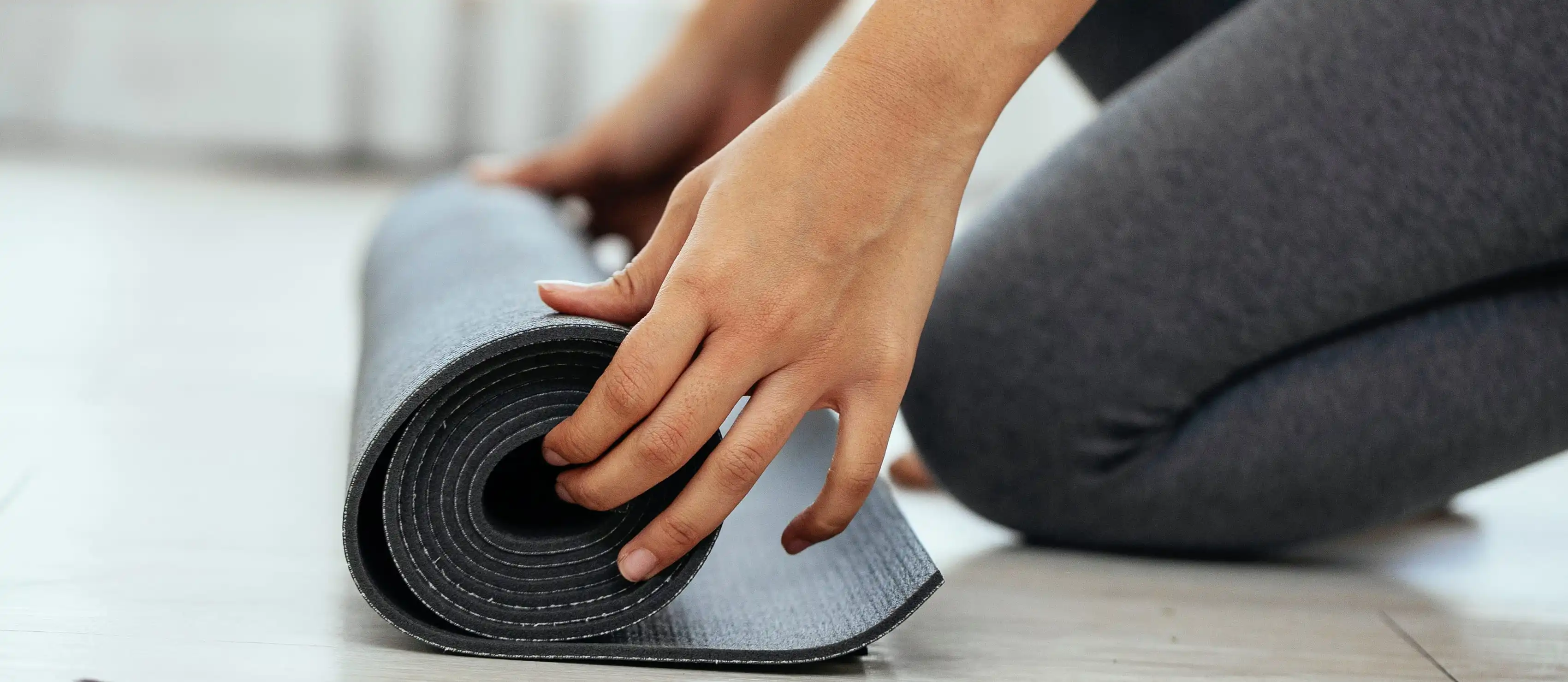 Rolling up a yoga mat