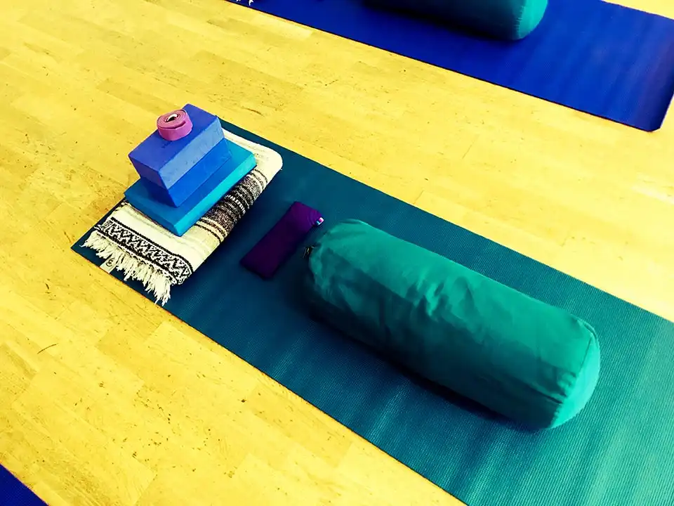 Bolster on a yoga mat