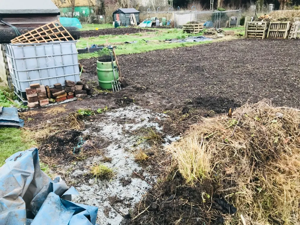 Clearing an allotment plot.