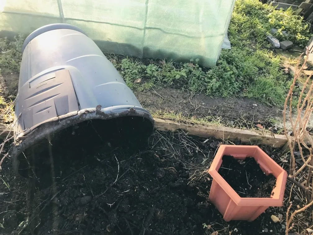 Sifting compost bin.