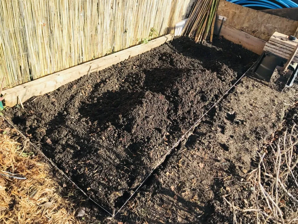 Sifting compost bin.