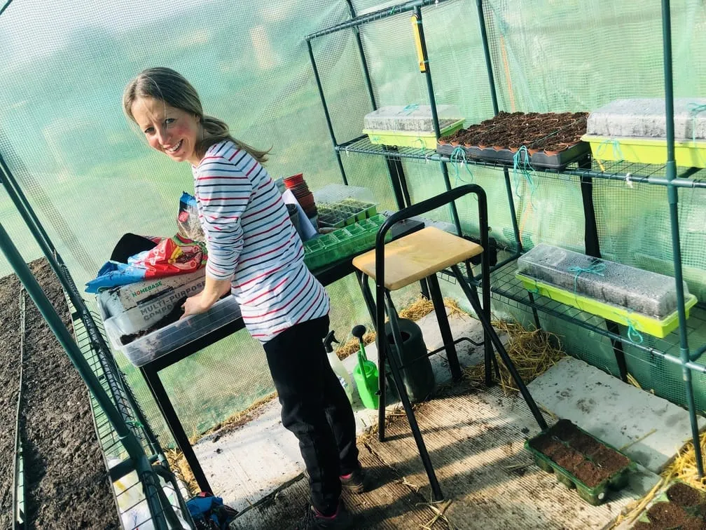 Vicky Salter sowing seeds at the allotment.
