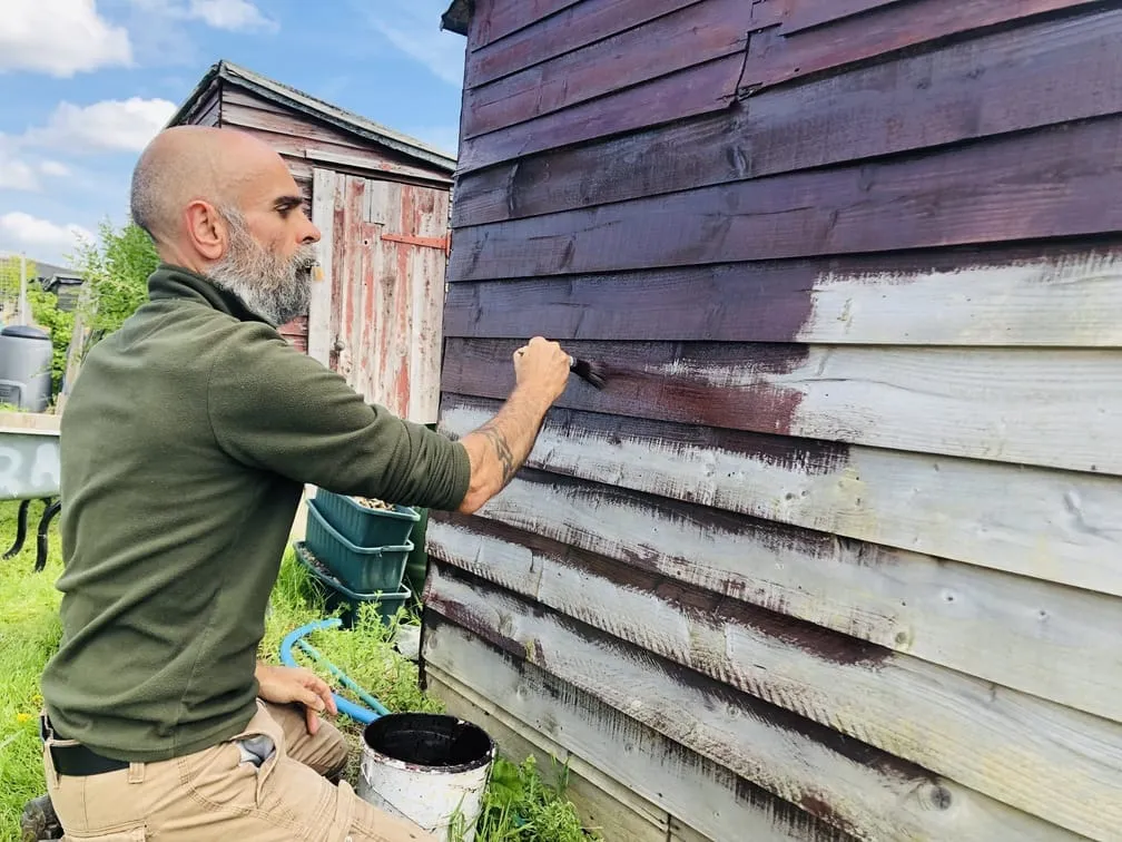Painting shed at the allotment.