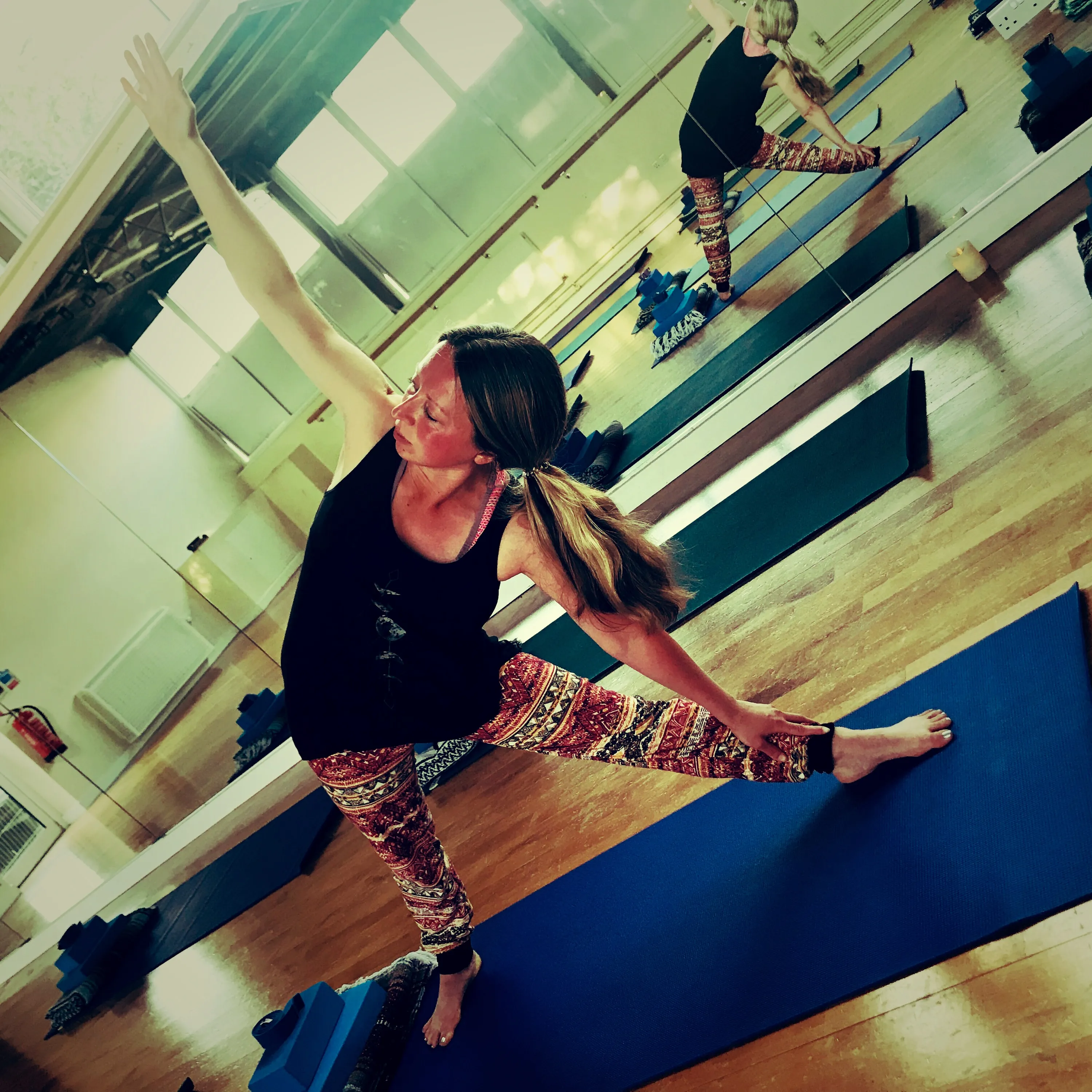 July weekly class pose five.